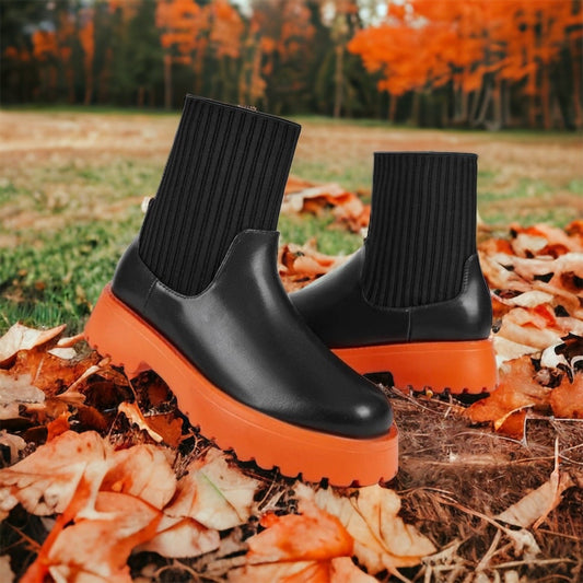 Orange and black boots women size 9.5