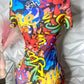 Colorful romper with hip hop streetwear inspired design pattern on  textured background.