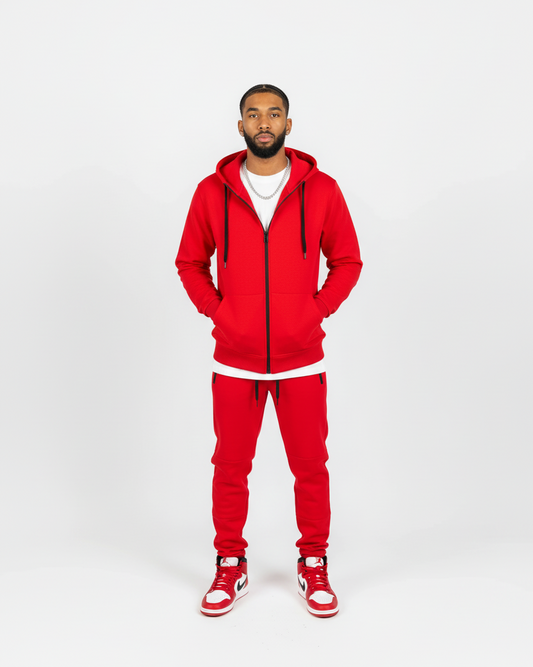 Red men’s tech fleece tracksuit from Ikonik Kingz, black zipper details, studio photo on white background.