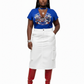 Woman wearing a blue graphic t-shirt, white skirt, and red boots on a white background