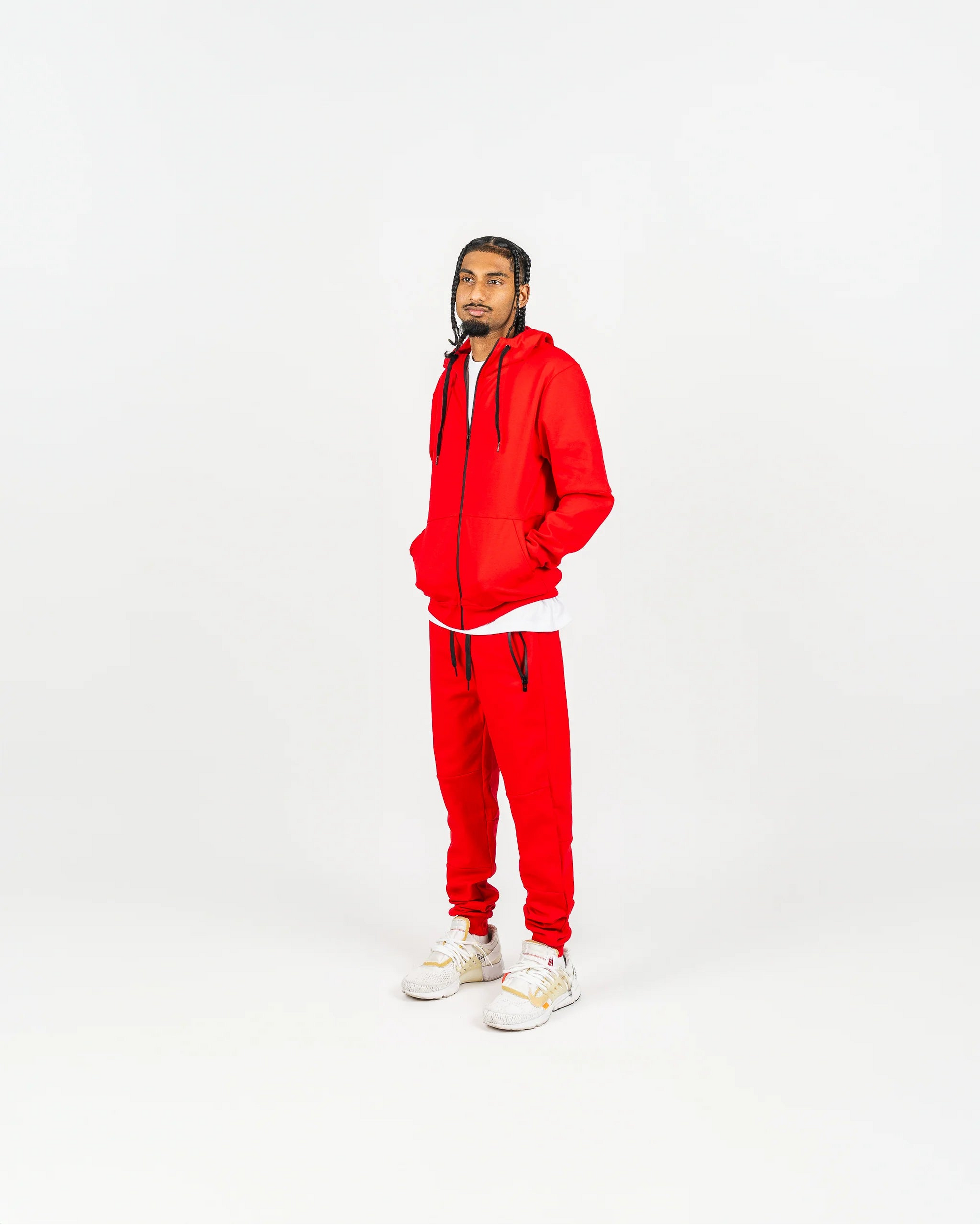 Full-body studio photo of red men’s fleece set, premium streetwear fit for men.