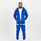 Close-up of royal blue men’s tech fleece hoodie showing drawstrings and premium fleece texture.