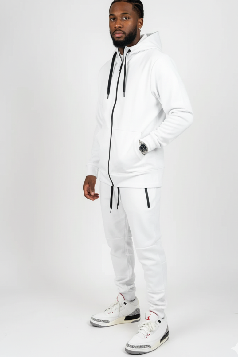 Front-facing studio photo of white men’s matching sweatsuit from Ikonik Kingz, clean luxury streetwear aesthetic.