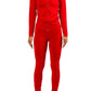 Model wearing bright red long sleeve tracksuit set with sneakers for sporty streetwear look