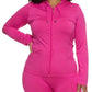 Curvy fashion model wearing pink two-piece legging set for casual streetwear outfit inspo
