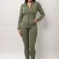 Olive green fall outift set on a plus-size model showing stretch fit and flattering waistline