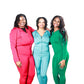Three women in red, blue, and green two-piece matching sets including a plus-size model, styled for curvy and regular body types
