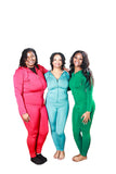 Three women in red, blue, and green two-piece matching sets including a plus-size model, styled for curvy and regular body types