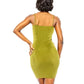 Back shot view angle of woman in a green sparkle shimmer mini dress with strappy heels