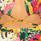 Printed colorful romper with cross detail, up close view